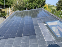 Thumbnail for Solar panels integrated into roof with skylight